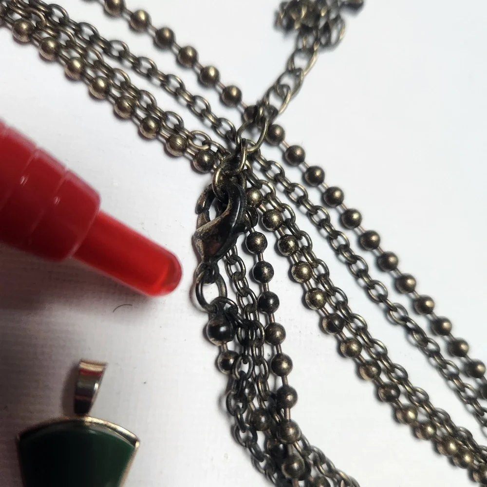 Ornate Bronze Filigree Cross Necklace and Green  acrylic Gold Tone Cross Pendant